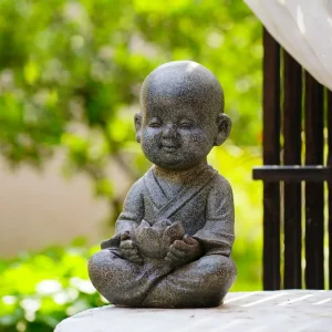 Bouddha Moine Enfant Tenant un Lotus